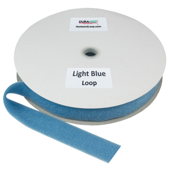 A roll of light blue DURAGRIP brand loop fastener material on a circular white cardboard spool, with a loose end of the tape extending forward.
