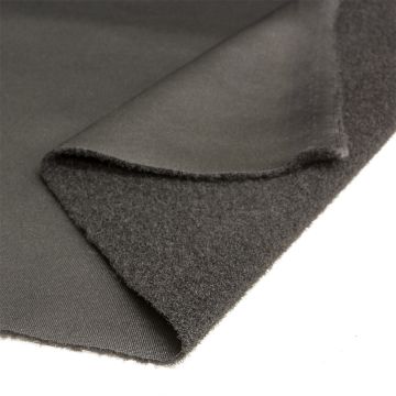 Black wide loop fabric sheet with a folded corner revealing a smooth backing texture.