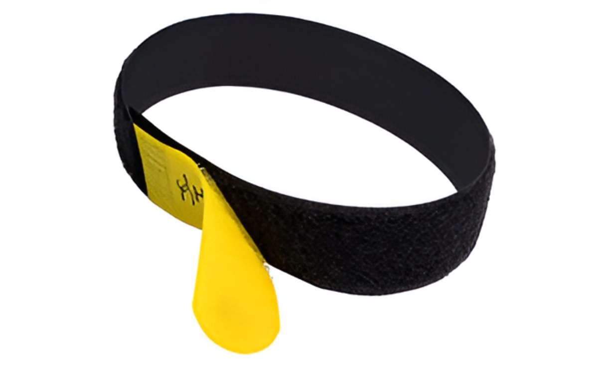 A screenshot of a backend content management system panel displaying fields for Title and URL-Key next to uploaded Featured and Mobile images of a black industrial loop strap with a yellow pull tab used for Hook and Loop Straps manufacturing.
